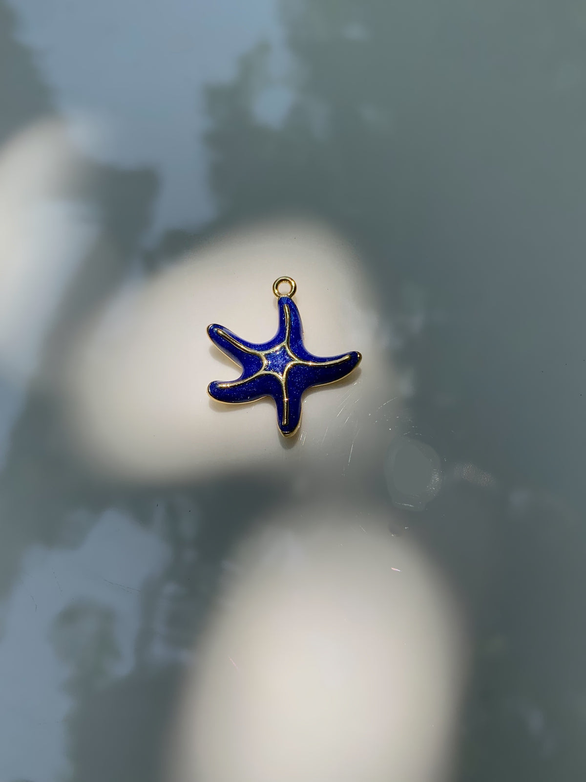 Blue starfish charm